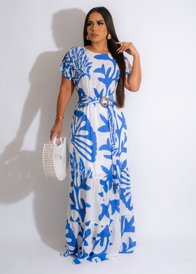 Beautiful blue maxi dress with ruffled sleeves and floral print