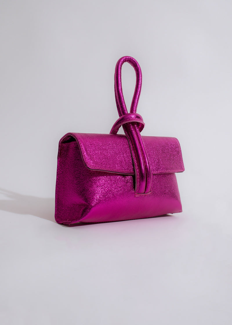 Dolce & Precious Glitter Handbag Pink featuring a stunning shimmering design with a stylish chain strap for versatile wear