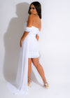 A stylish and elegant white mini dress with intricate mesh detailing