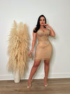 A gorgeous nude mini dress adorned with mystical butterfly mesh and rhinestones