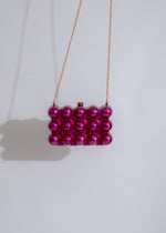 Luxurious and high-quality purple clutch purse with intricate detailing and versatile design for any occasion