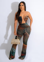  Model wearing brown mesh jumpsuit with wide-leg pants and belted waist