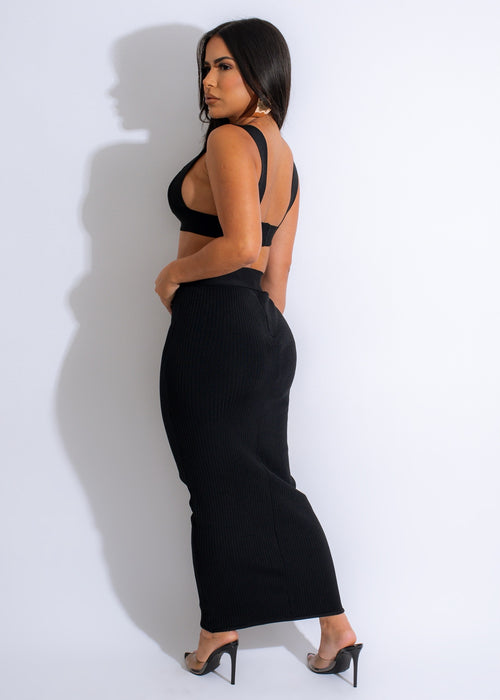  Stylish and seductive All Your Love Bandage Skirt Set Black showcasing a sleek and slimming black bandage skirt paired with a coordinating crop top

