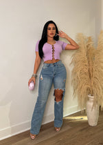 Sleek purple knitted crop top with a casual and stylish design