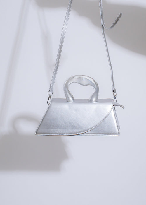  A close-up image of the My Decision Handbag Silver, showcasing its intricate stitching and high-quality craftsmanship