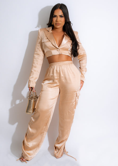 A high-quality silk cargo pant set in a nude color