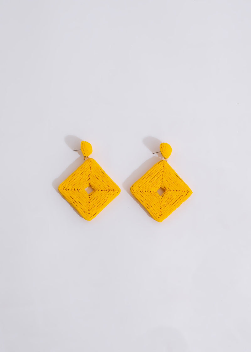 Beautiful yellow Try Me Earring with intricate details and elegant design