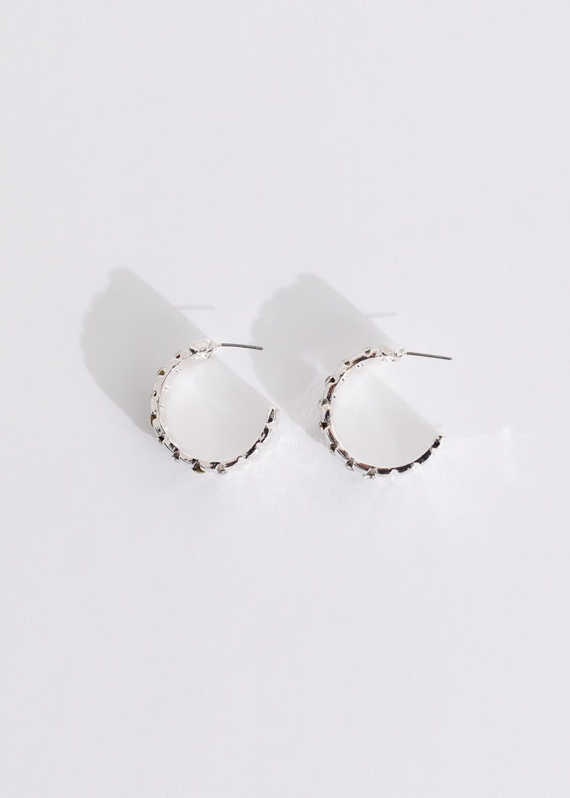 Shiny silver earrings with a unique design, perfect for elevating your style