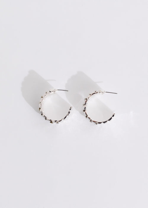 Shiny silver earrings with a unique design, perfect for elevating your style
