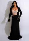 Elegant evening gown featuring shimmering rhinestone details and chic cutouts