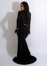 Beautiful long black dress adorned with stunning rhinestones for a glamorous look