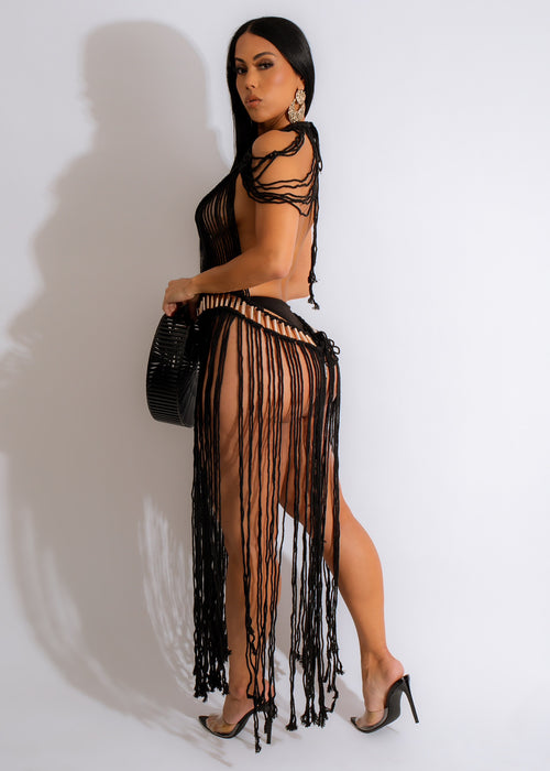 A stylish and versatile black macrame cover up, perfect for beachwear