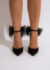 Black pointed-toe high heel with stiletto heel and ankle strap