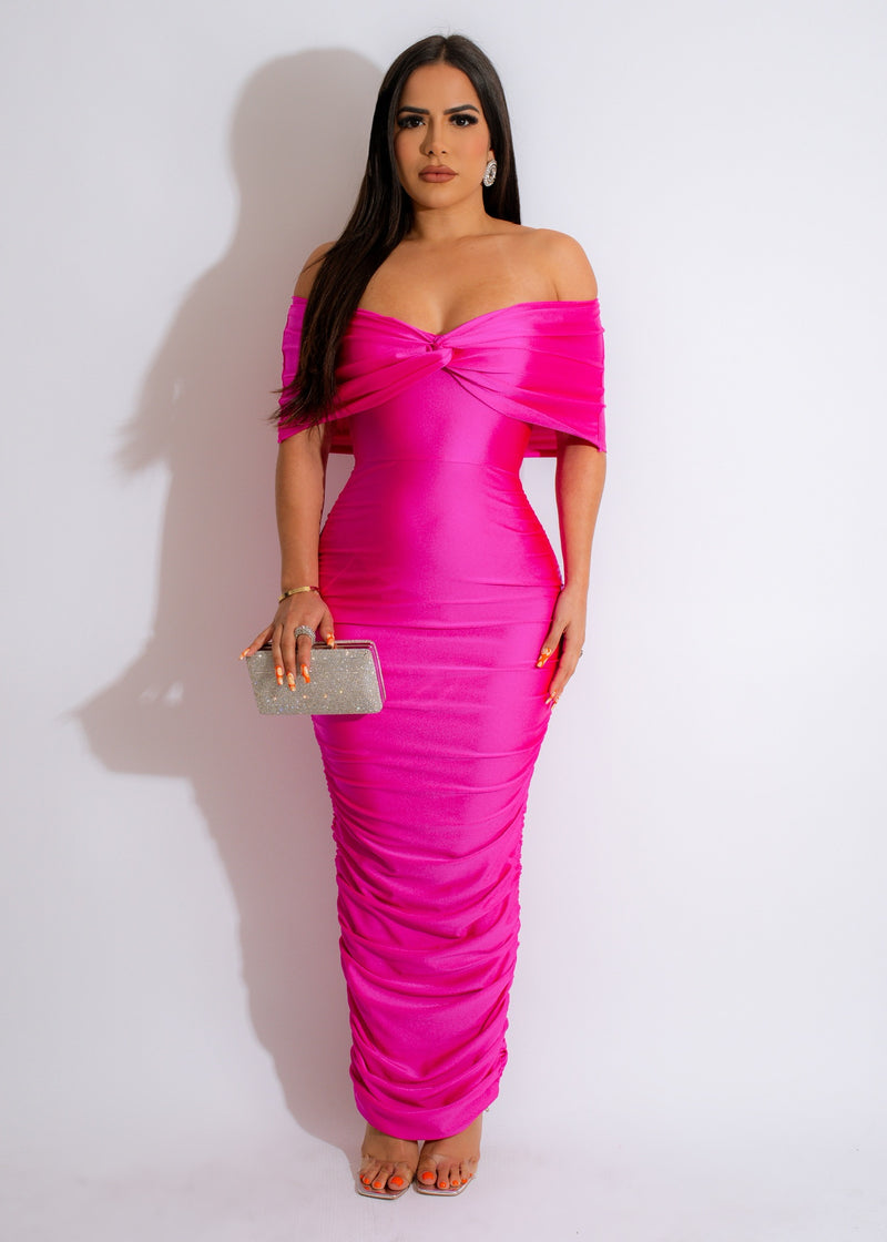Long sleeve pink ruched maxi dress with a free-flowing silhouette
