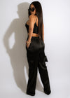 Stunning black satin jumpsuit with a sleek and elegant design