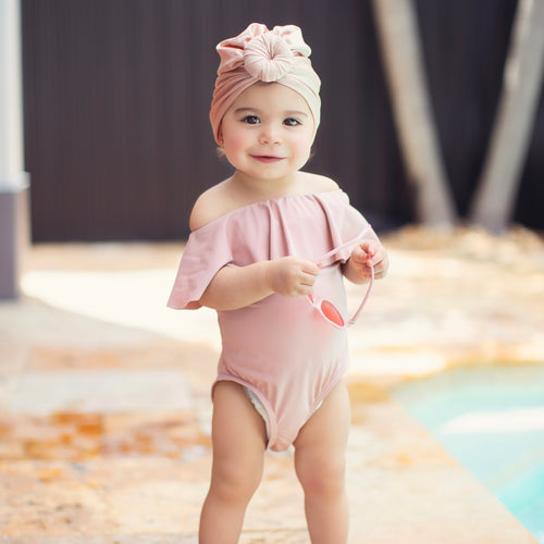 Adorable Susanas BabyGirl Swimsuit in pink with ruffled details and floral pattern